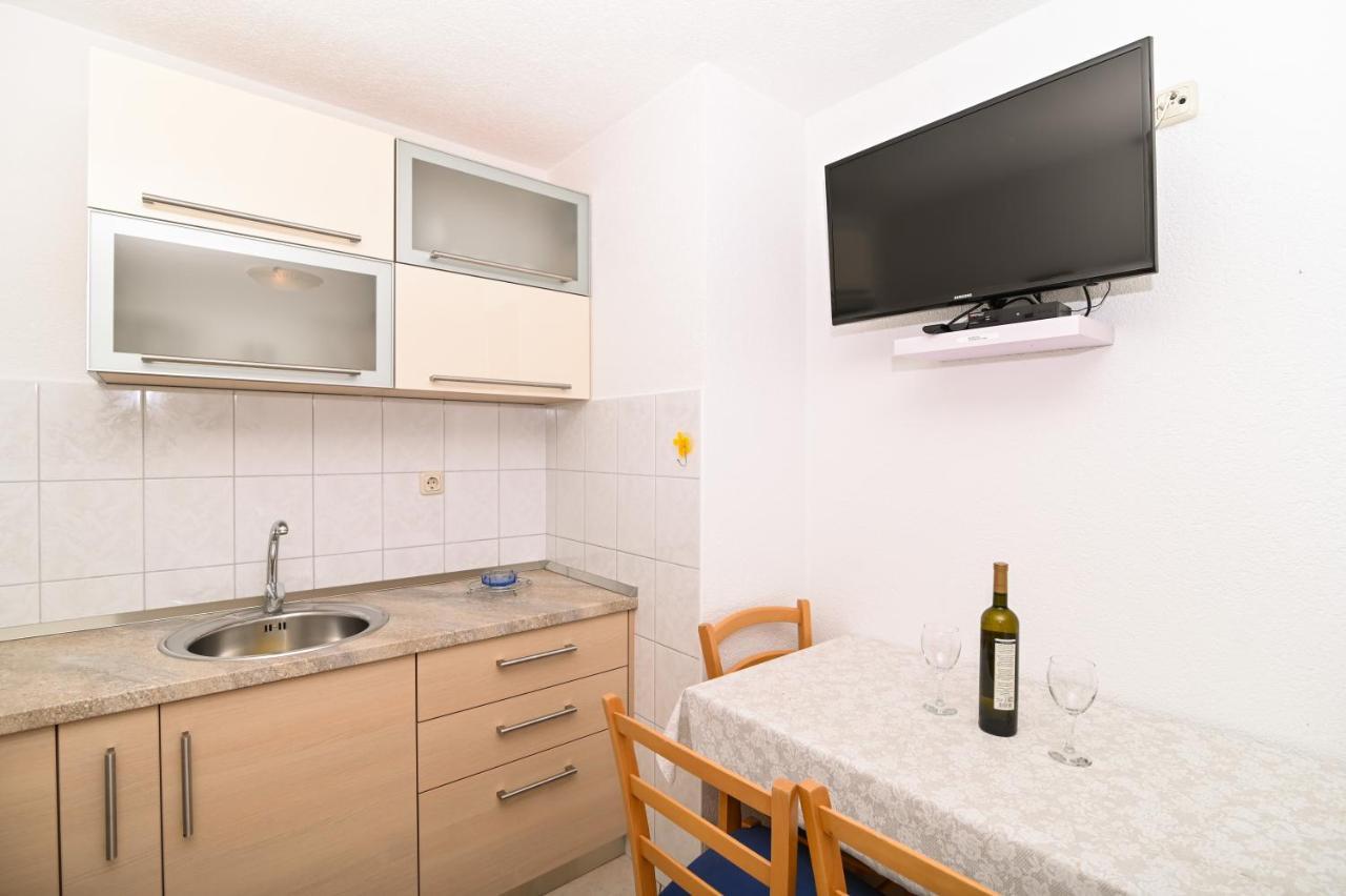 Apartmani Adria โตรกีร์ ภายนอก รูปภาพ